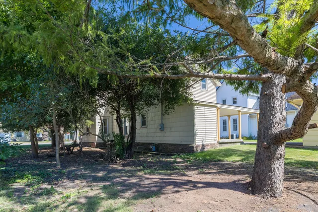 a view of a house with a patio
