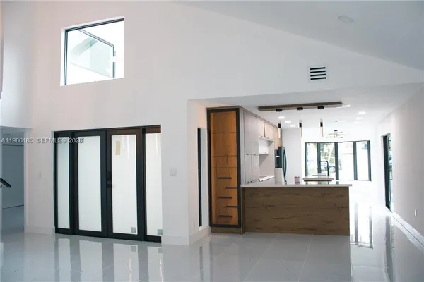 view of hall way with furniture
