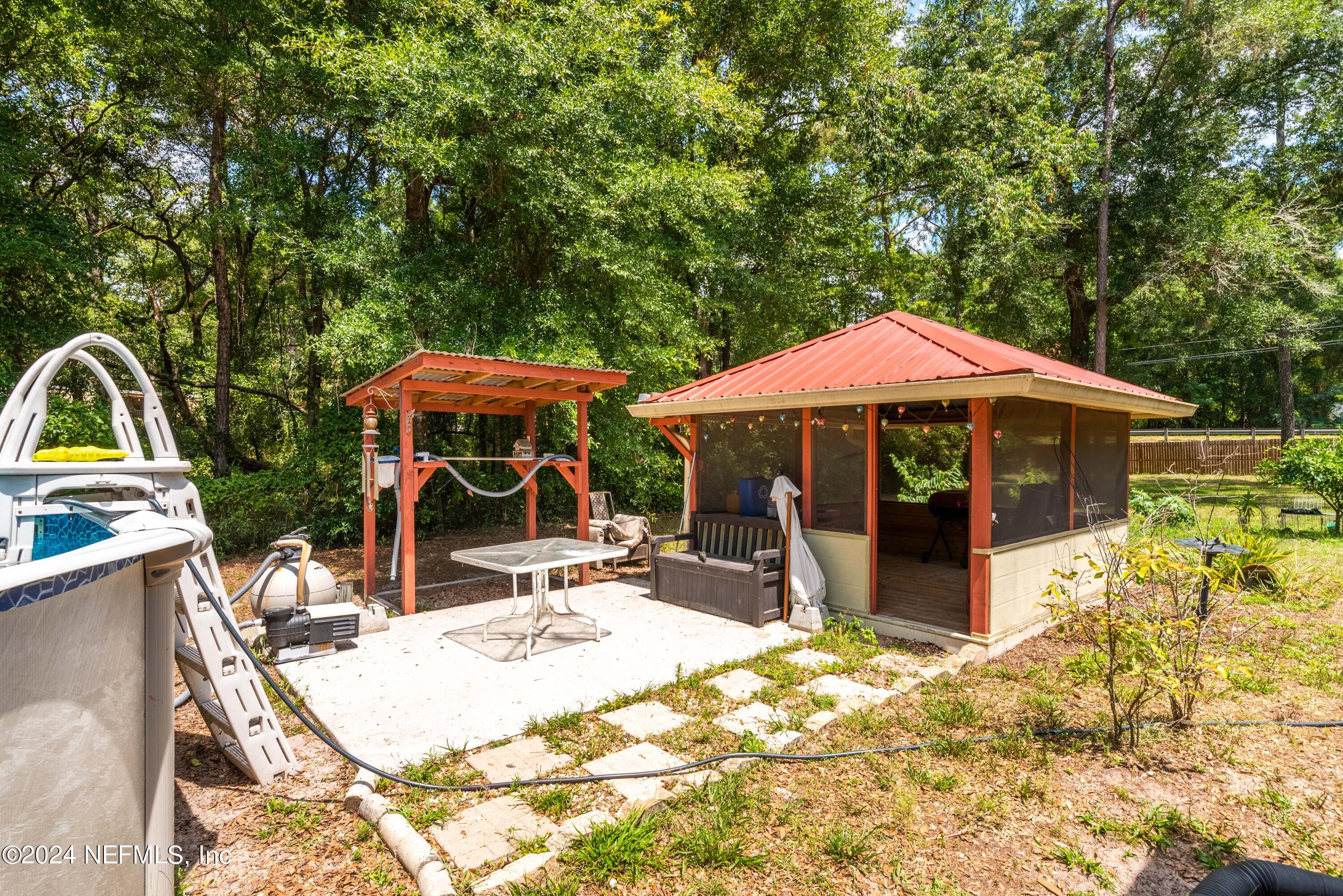 2592 Myrtle Loop Middleburg, FL 32068 - Photo 24 of 33 Covered Pool House