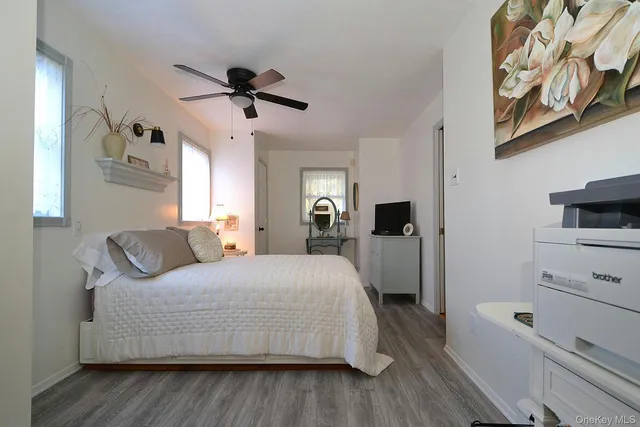 a bedroom with a bed and a view of bathroom