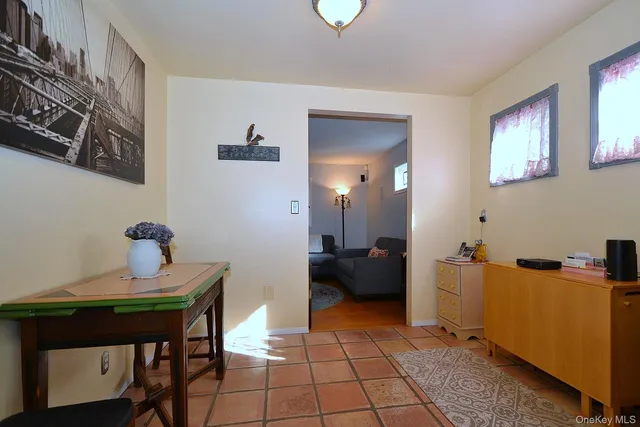 a view of a workspace with furniture