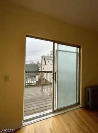 a view of a room that has a large window