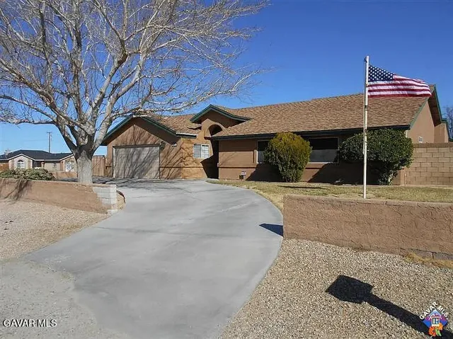 a house view with a outdoor space