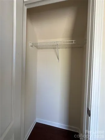 a view of small space with racks on the wall