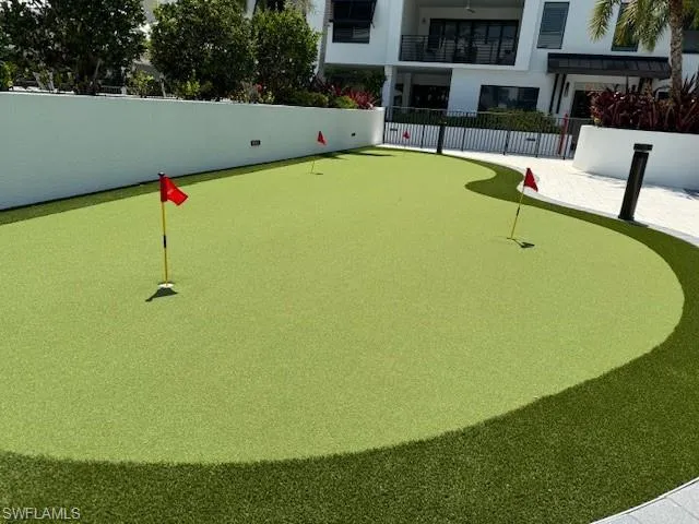 a kitchen with a table and chairs in it
