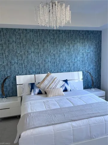 a view of swimming pool with a yard and plants