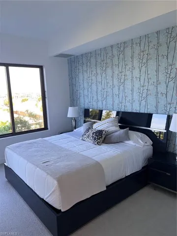 a view of a dinning table and chairs in the patio