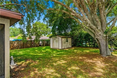 a view of a back yard of the house