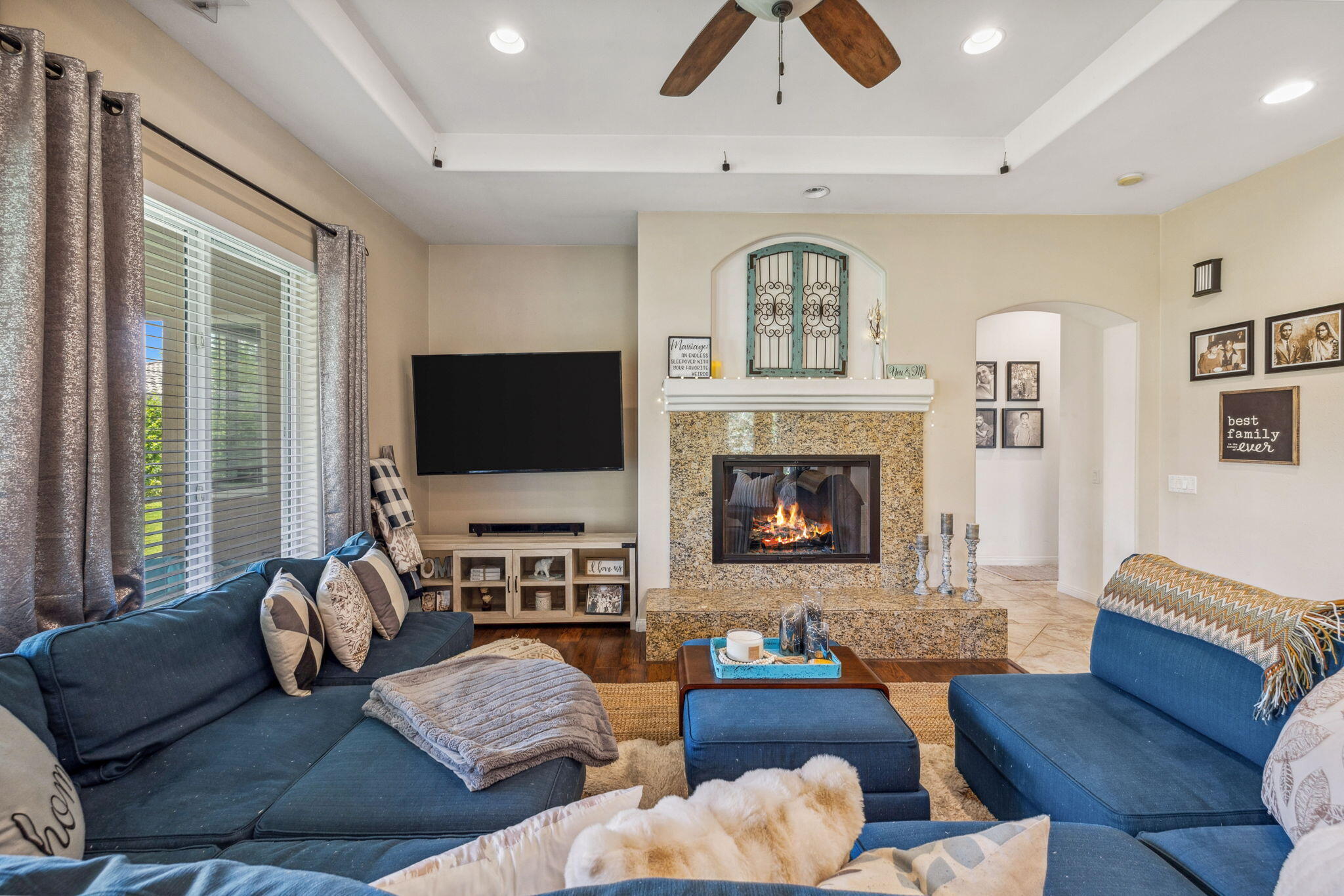 79040 Shadow Trail La Quinta, CA 92253 - Photo 18 of 69 a living room with furniture flat screen tv and a large window