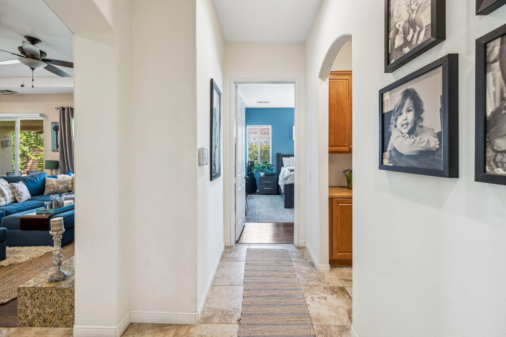 79040 Shadow Trail La Quinta, CA 92253 - Photo 37 of 69 a view of a hallway with wooden floor and furniture