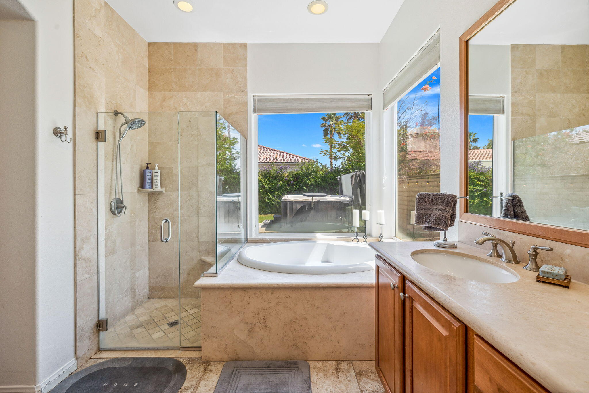 79040 Shadow Trail La Quinta, CA 92253 - Photo 44 of 69 a bathroom with a granite countertop sink and a mirror