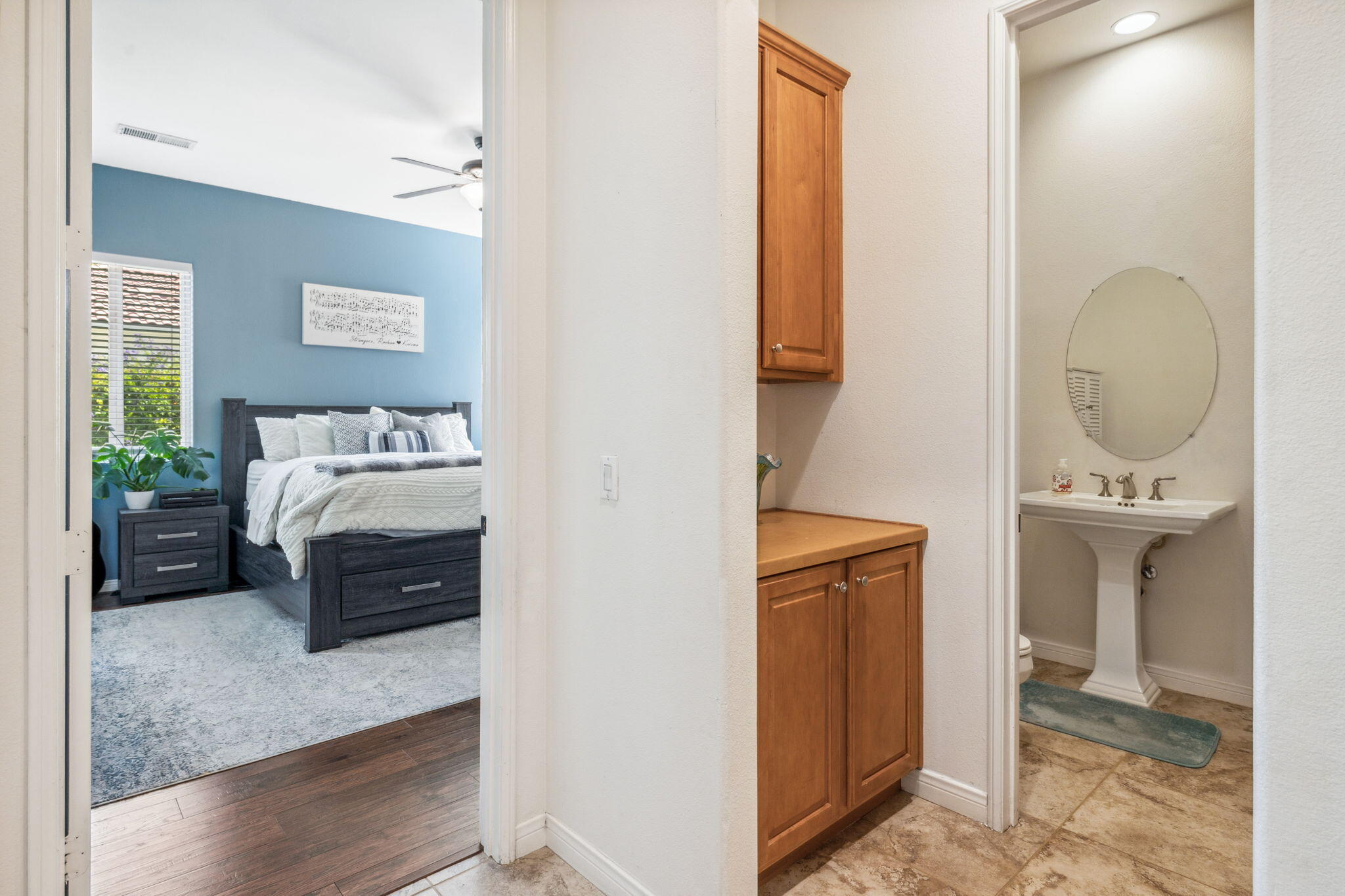 79040 Shadow Trail La Quinta, CA 92253 - Photo 45 of 69 a en suite bathroom with a granite countertop sink and a mirror
