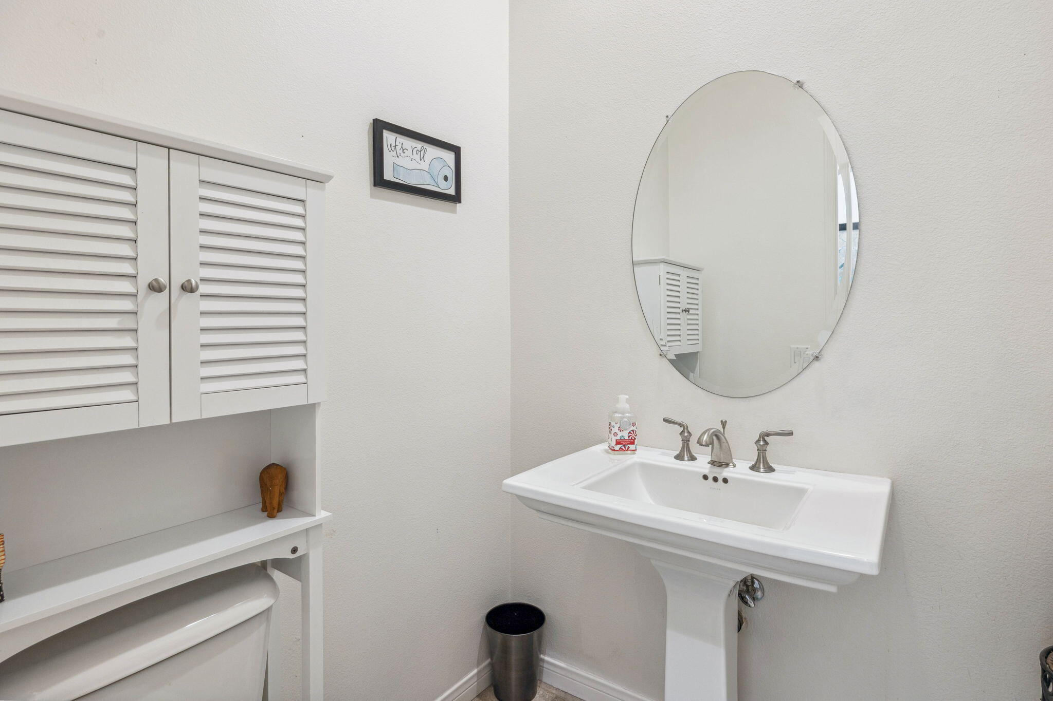 79040 Shadow Trail La Quinta, CA 92253 - Photo 46 of 69 a bathroom with a sink and a mirror