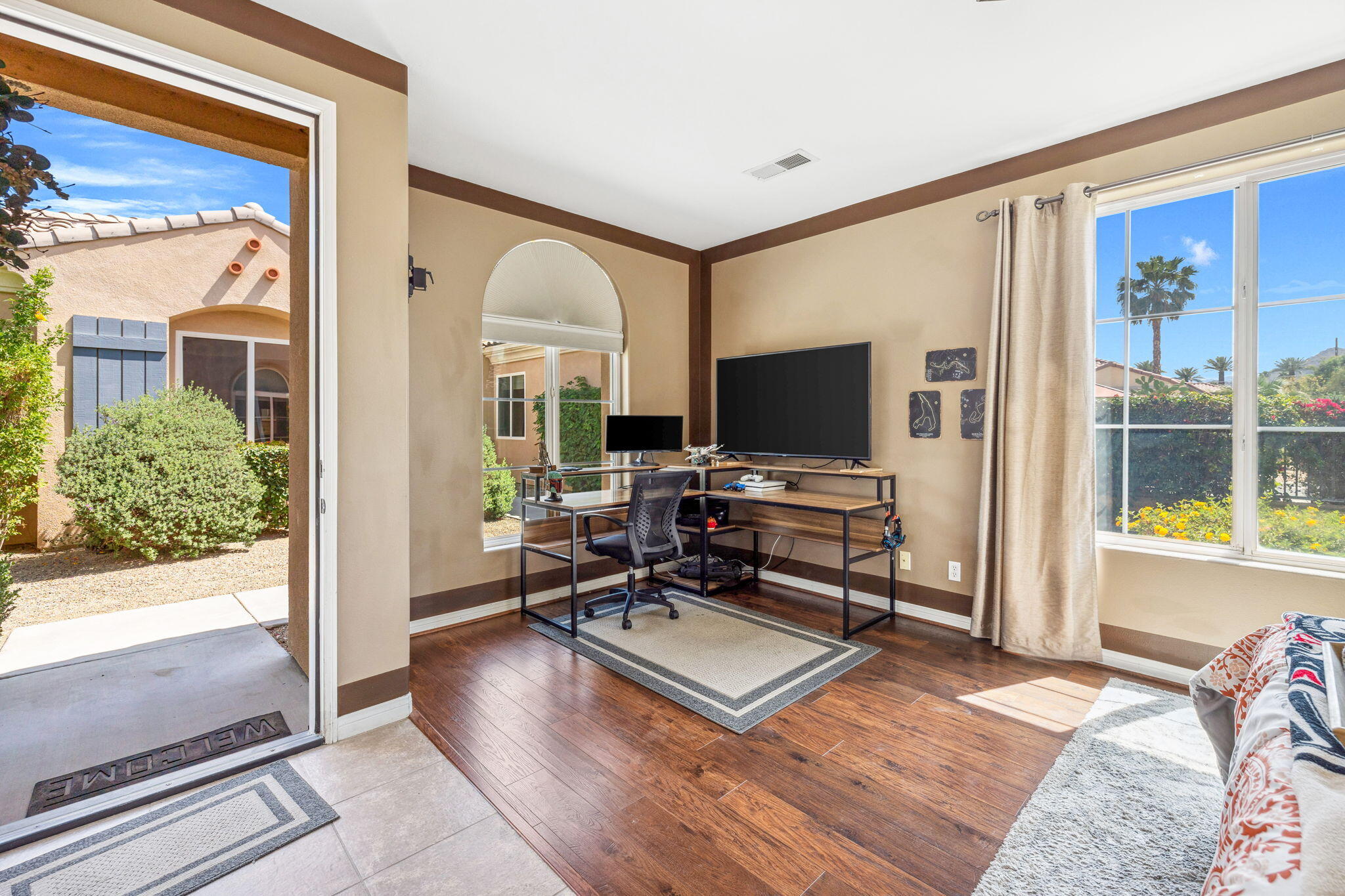 79040 Shadow Trail La Quinta, CA 92253 - Photo 60 of 69 a living room with furniture a rug and a window