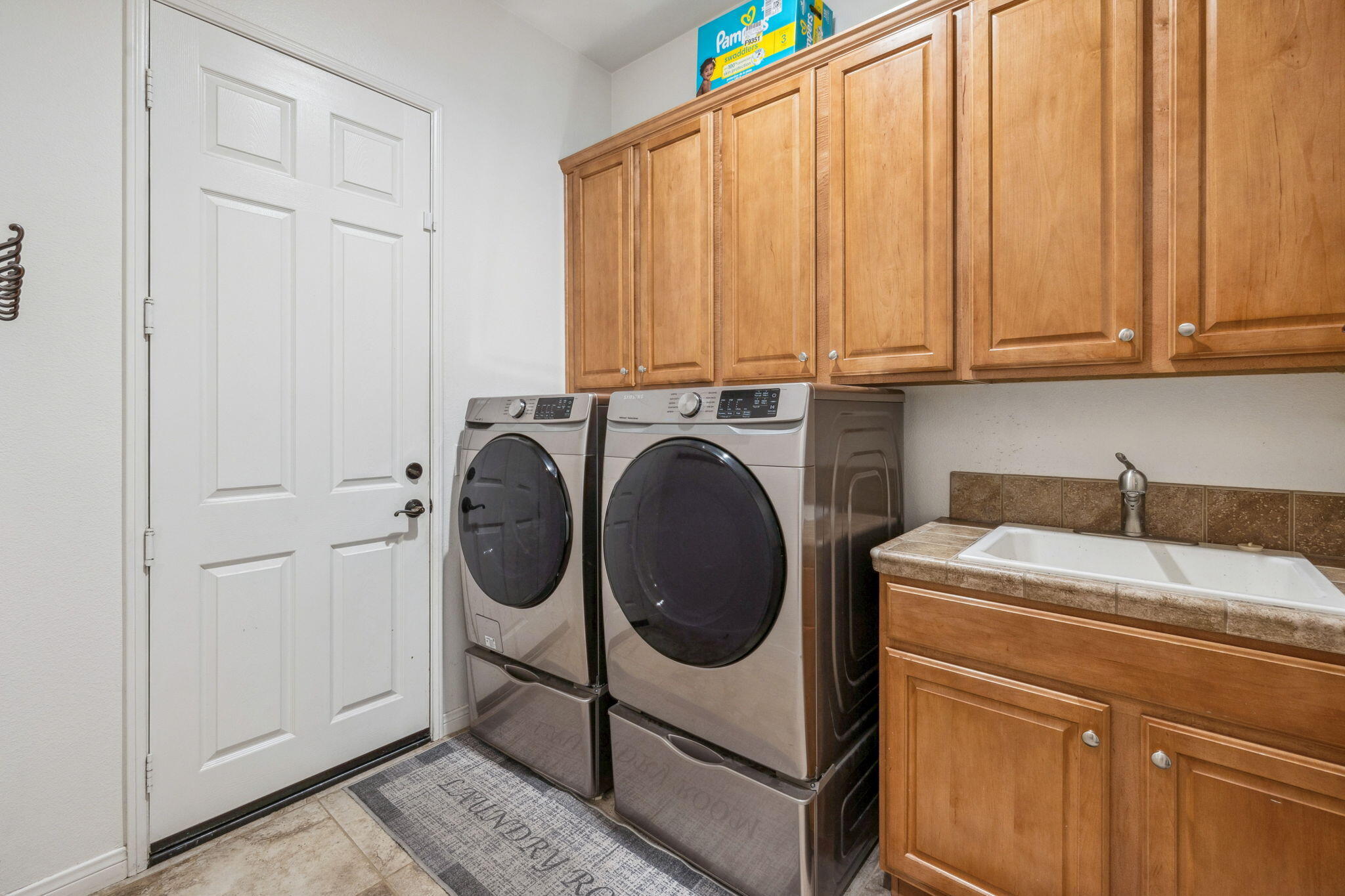 79040 Shadow Trail La Quinta, CA 92253 - Photo 64 of 69 a utility room with dryer and washer