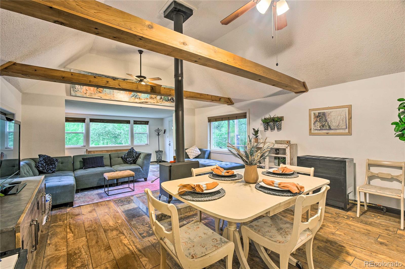 7559 South Turkey Creek Road Morrison, CO 80465 - Photo 12 of 40 a view of a dining room with furniture window and outside view