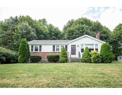 40 Woodruff Road Walpole, MA 02081 - Photo 1 of 31 a front view of a house with a yard