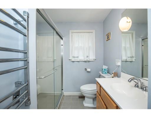 40 Woodruff Road Walpole, MA 02081 - Photo 17 of 31 a bathroom with a sink toilet and shower