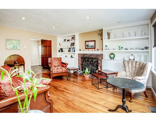 40 Woodruff Road Walpole, MA 02081 - Photo 4 of 31 a living room with furniture and a fireplace