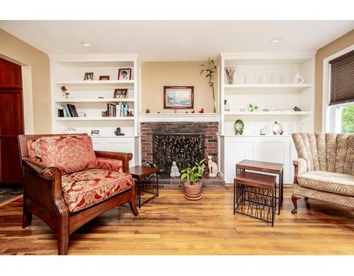 40 Woodruff Road Walpole, MA 02081 - Photo 5 of 31 a living room with furniture and a fireplace