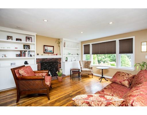 40 Woodruff Road Walpole, MA 02081 - Photo 6 of 31 a living room with furniture and a fireplace