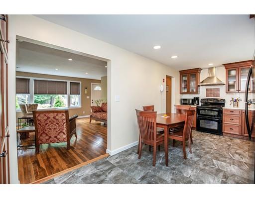 40 Woodruff Road Walpole, MA 02081 - Photo 10 of 31 a living room with dining room and wooden floor