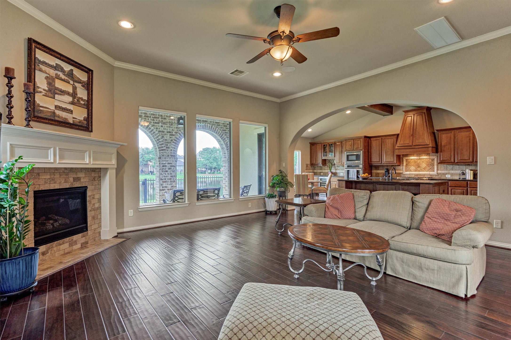 82 East Crystal Canyon Circle The Woodlands, TX 77389 - Photo 48 of 50 You'll appreciate the exceptional flow and functionality of this immaculate floor plan, with the great room seamlessly opening to the kitchen.