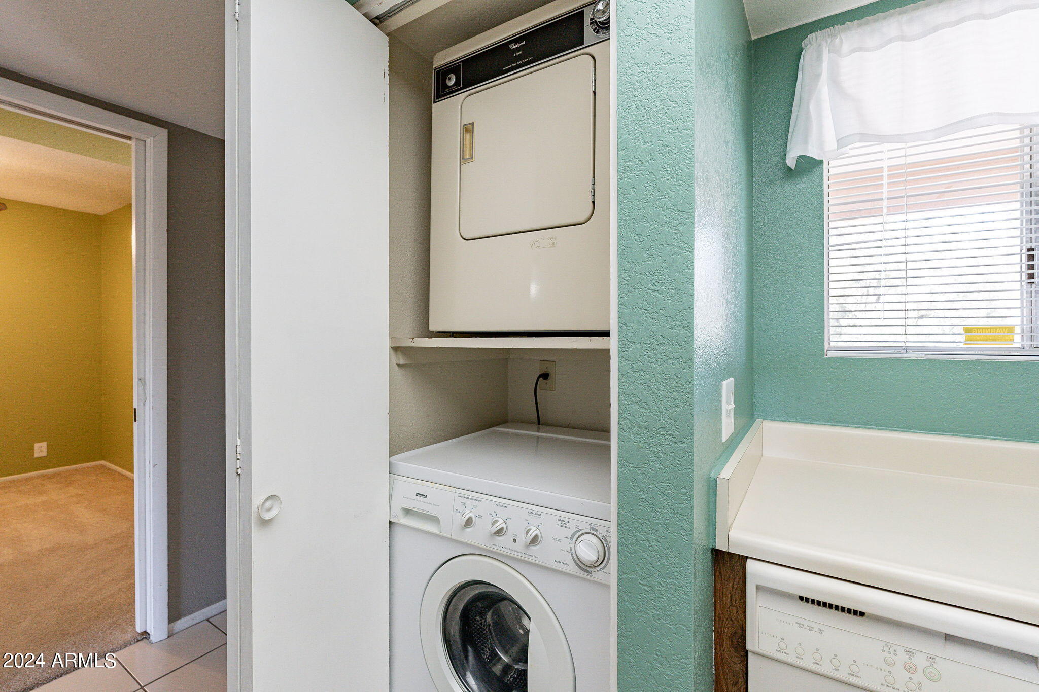 4150 East Cactus Road, Unit 208 Phoenix, AZ 85032 - Photo 34 of 57 Laundry in Kitchen