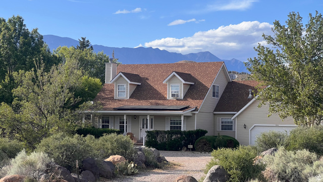 220 West Old Church Road Toquerville, UT 84774 - Photo 1 of 1 View of front facade featuring a porch, a mountain view, and a chimney
