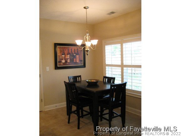 49 Germantown Road Cameron, NC 28326 - Photo 12 of 25 a dining room with furniture and window