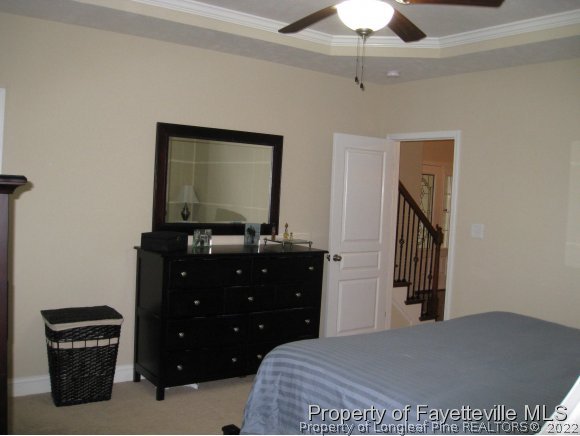 49 Germantown Road Cameron, NC 28326 - Photo 15 of 25 a bedroom with a bed and a dresser