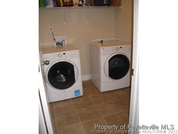 49 Germantown Road Cameron, NC 28326 - Photo 24 of 25 a utility room with dryer and washer