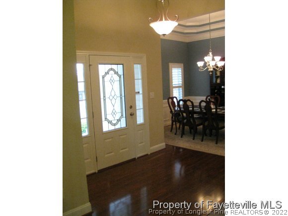 49 Germantown Road Cameron, NC 28326 - Photo 8 of 25 a view of a dining room with furniture and chandelier