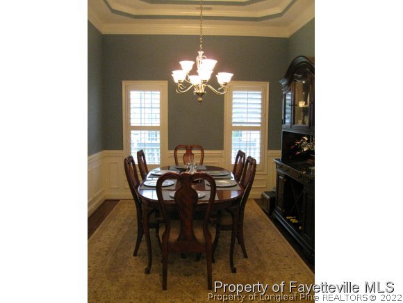 49 Germantown Road Cameron, NC 28326 - Photo 10 of 25 a view of a dining room with furniture and chandelier