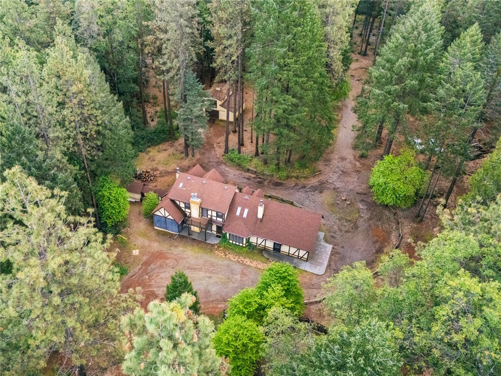 5555 Platt Mountain Road Forest Ranch, CA 95942 - Photo 2 of 55 an aerial view of a house with a yard and garden