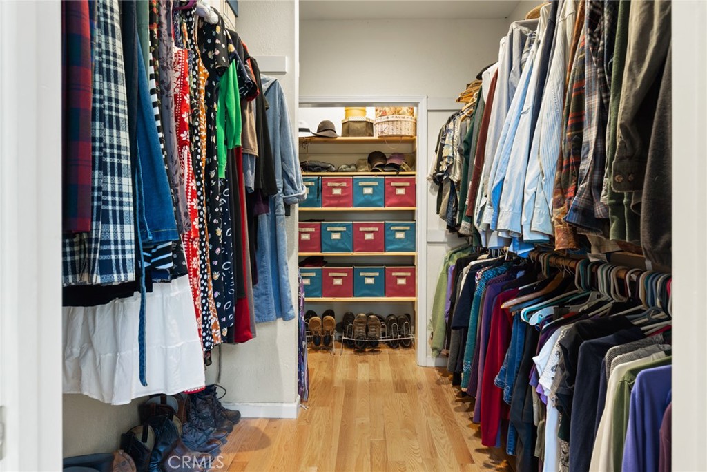 5555 Platt Mountain Road Forest Ranch, CA 95942 - Photo 22 of 55 a view of walk in closet with clothes and shoes
