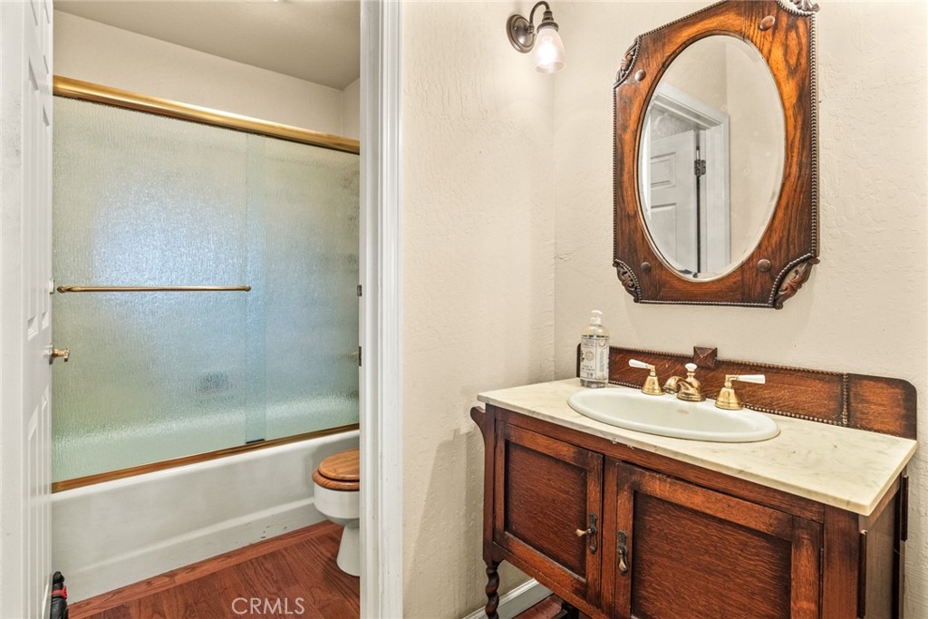 5555 Platt Mountain Road Forest Ranch, CA 95942 - Photo 29 of 55 a bathroom with a sink and a mirror