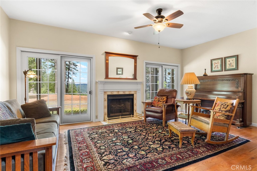 5555 Platt Mountain Road Forest Ranch, CA 95942 - Photo 3 of 55 a living room with furniture a window and a fireplace