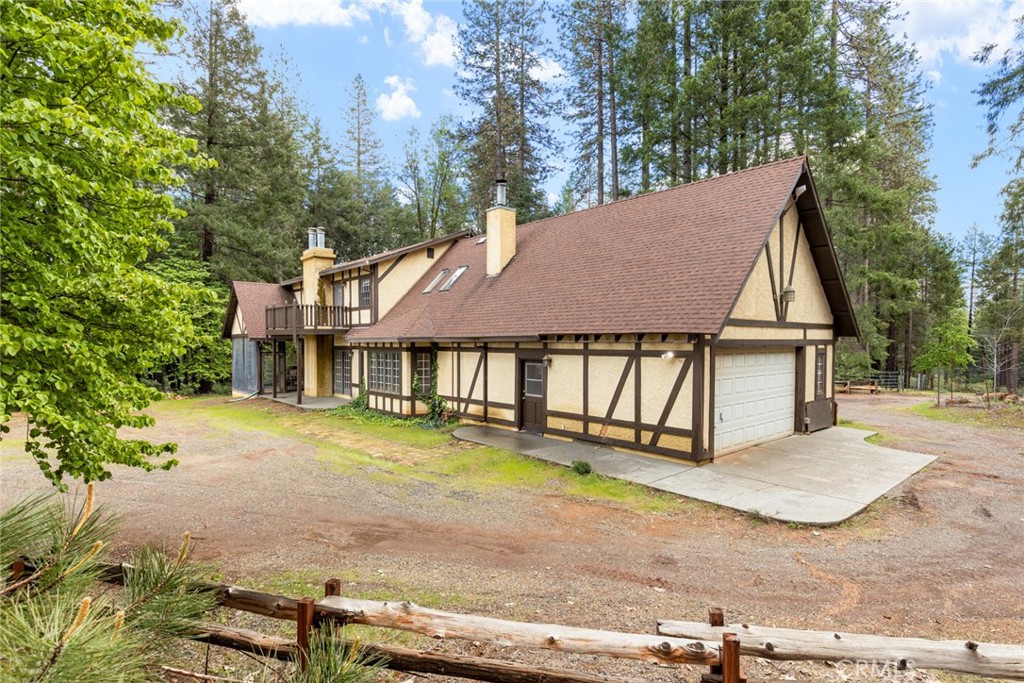 5555 Platt Mountain Road Forest Ranch, CA 95942 - Photo 40 of 55 front view of a house with a yard