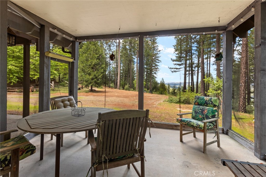 5555 Platt Mountain Road Forest Ranch, CA 95942 - Photo 44 of 55 a view of a room with a furniture and garden