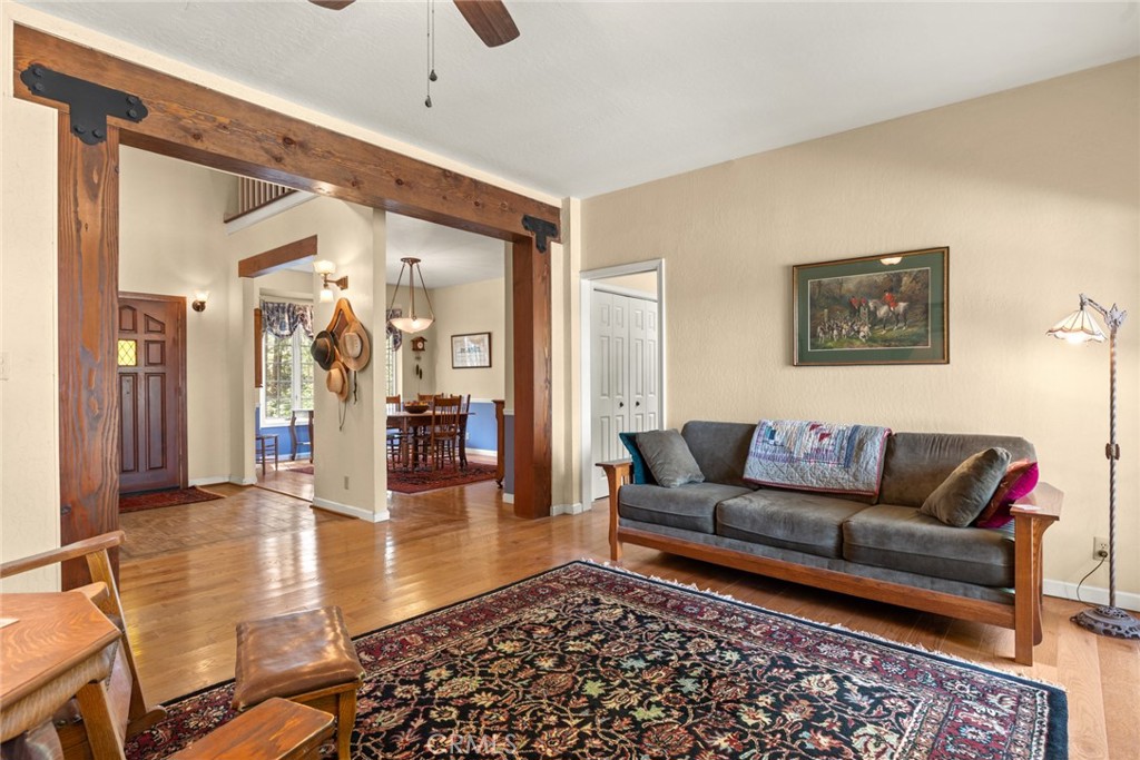 5555 Platt Mountain Road Forest Ranch, CA 95942 - Photo 5 of 55 a living room with furniture and wooden floor