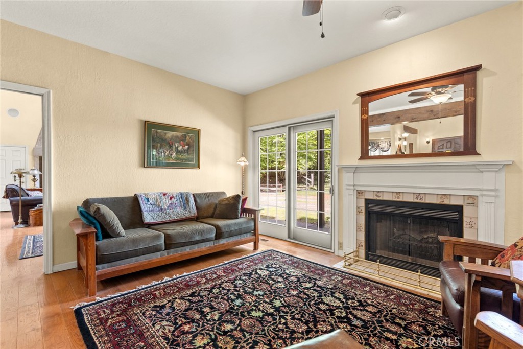 5555 Platt Mountain Road Forest Ranch, CA 95942 - Photo 6 of 55 a living room with furniture and a fireplace