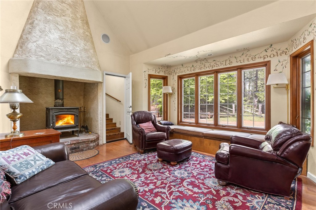 5555 Platt Mountain Road Forest Ranch, CA 95942 - Photo 7 of 55 a living room with furniture or couch and a fireplace