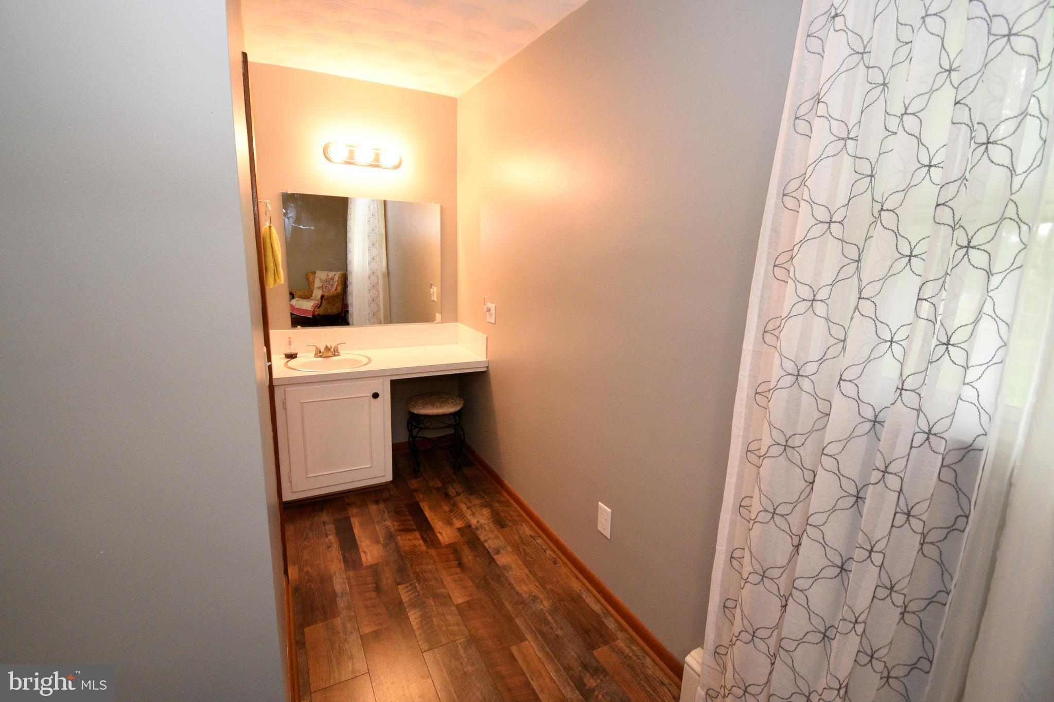 6331 Old Carlisle Road Dover, PA 17315 - Photo 23 of 37 Vanity area and sink in Primary Bedroom