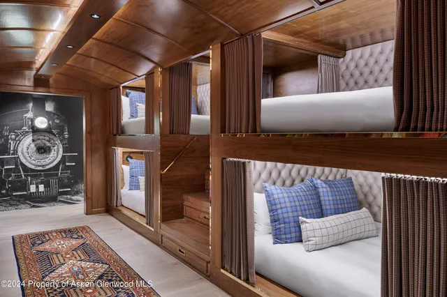 a view of an entryway with a rug