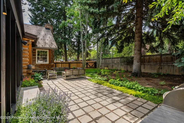 a garden view with a seating space