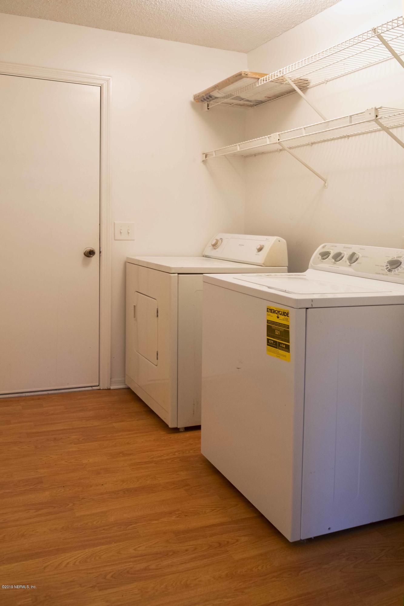 133 Shamrock Road St. Augustine, FL 32086 - Photo 27 of 31 a utility room with dryer and washer