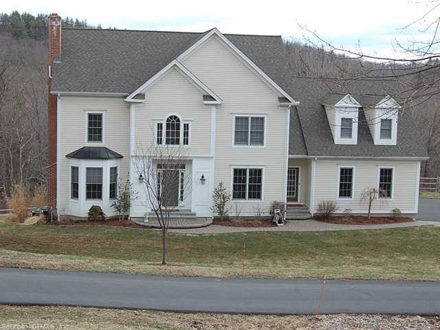 253 Gracey Road Canton, CT 06019 - Photo 1 of 1 a front view of a house with a yard