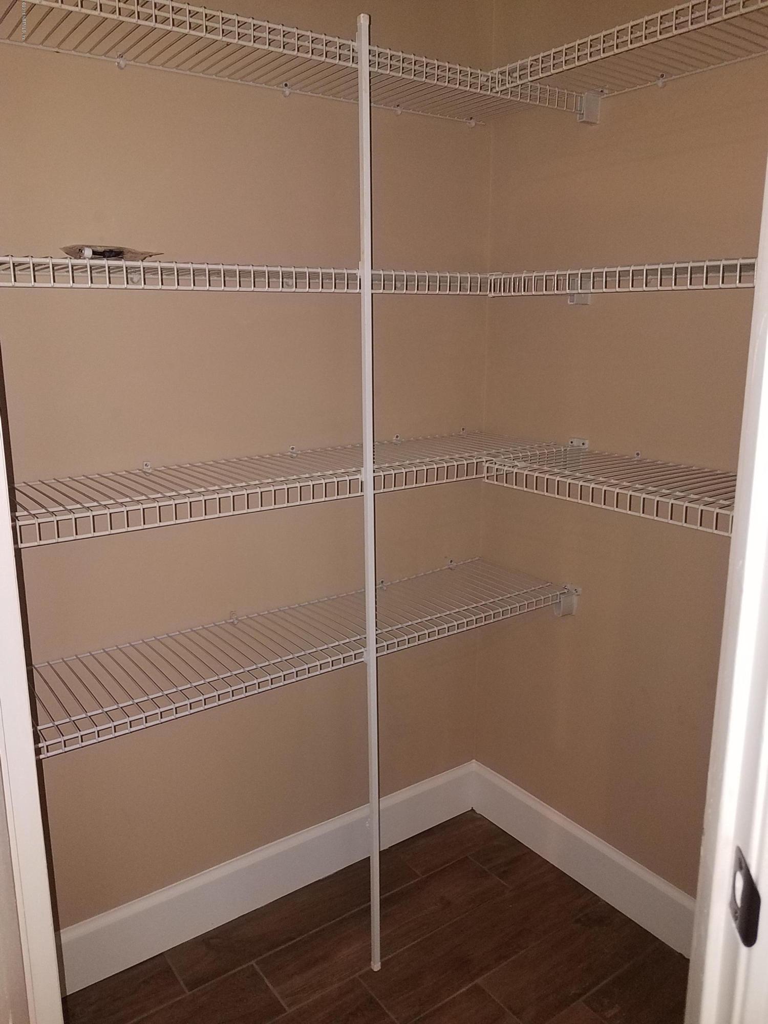 920 Silver Spring Court St. Augustine, FL 32092 - Photo 22 of 24 kitchen pantry
