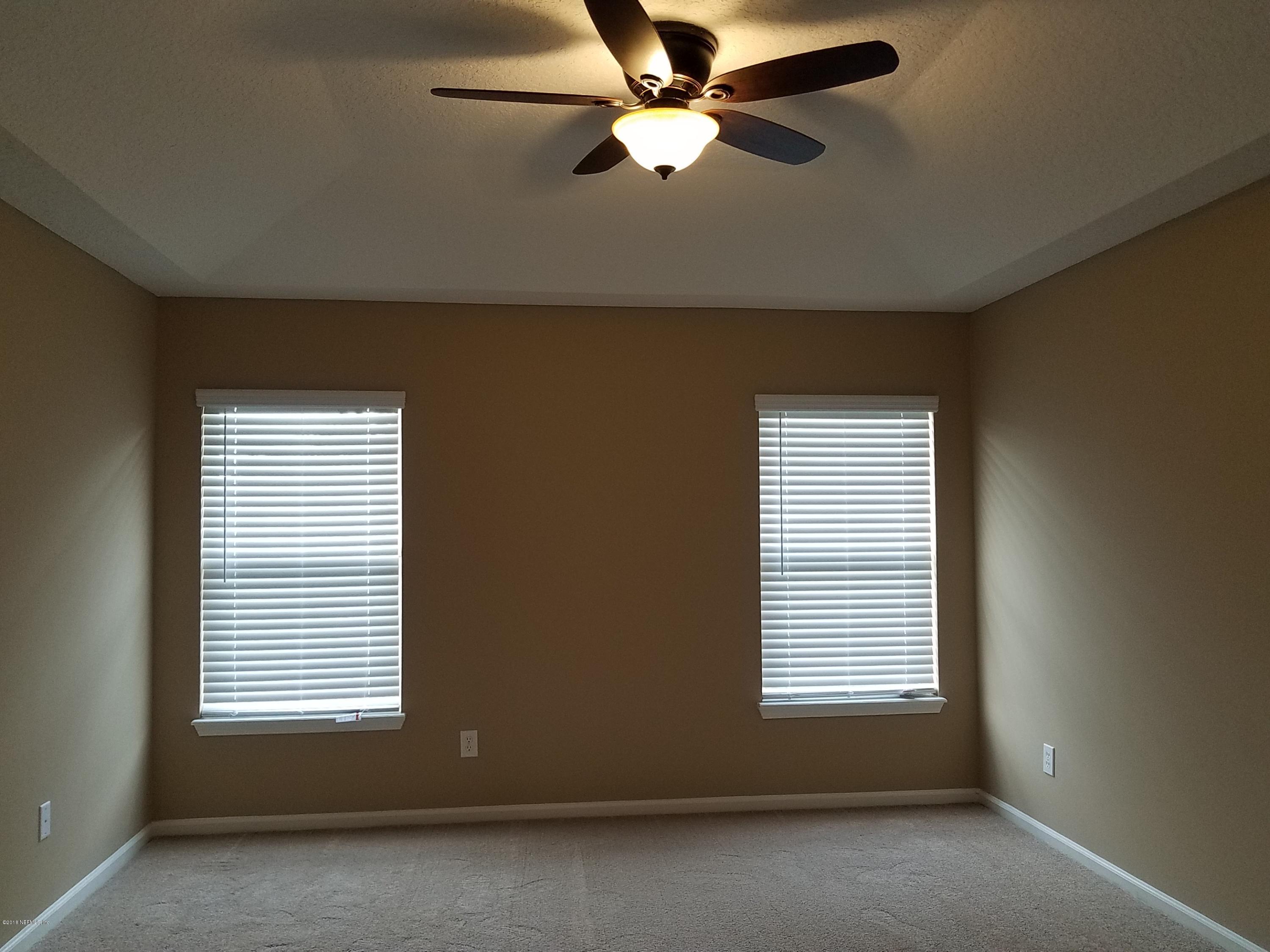 920 Silver Spring Court St. Augustine, FL 32092 - Photo 10 of 24 master bedroom tray ceiling with fan
